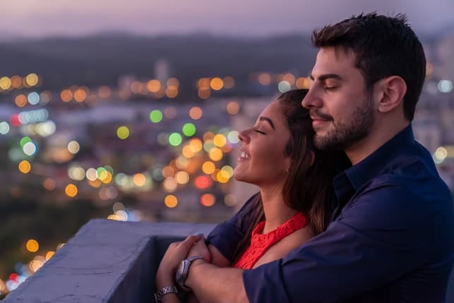 a couple enjoying a city view together