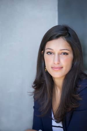 a portrait of an oriental young woman indoors