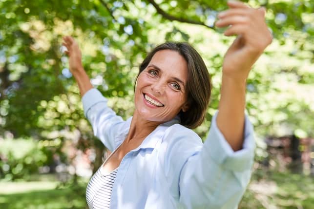 woman dancing in the garden
